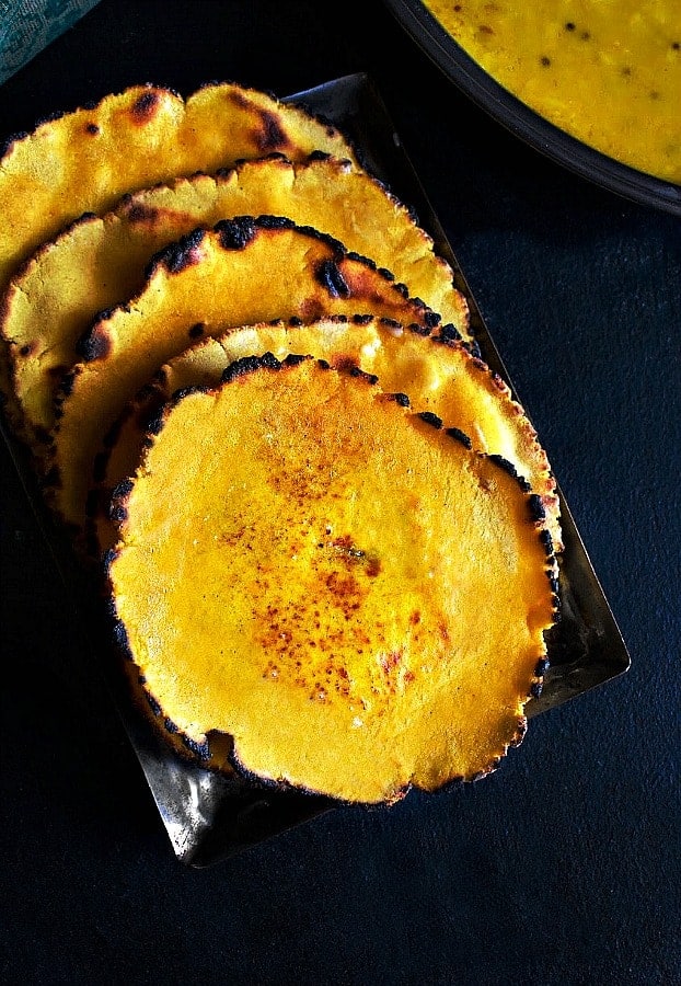 makki ki roti on a black background. Step by step process to make makki di roti