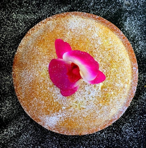 Moist Lemon Yogurt Cake on a black background