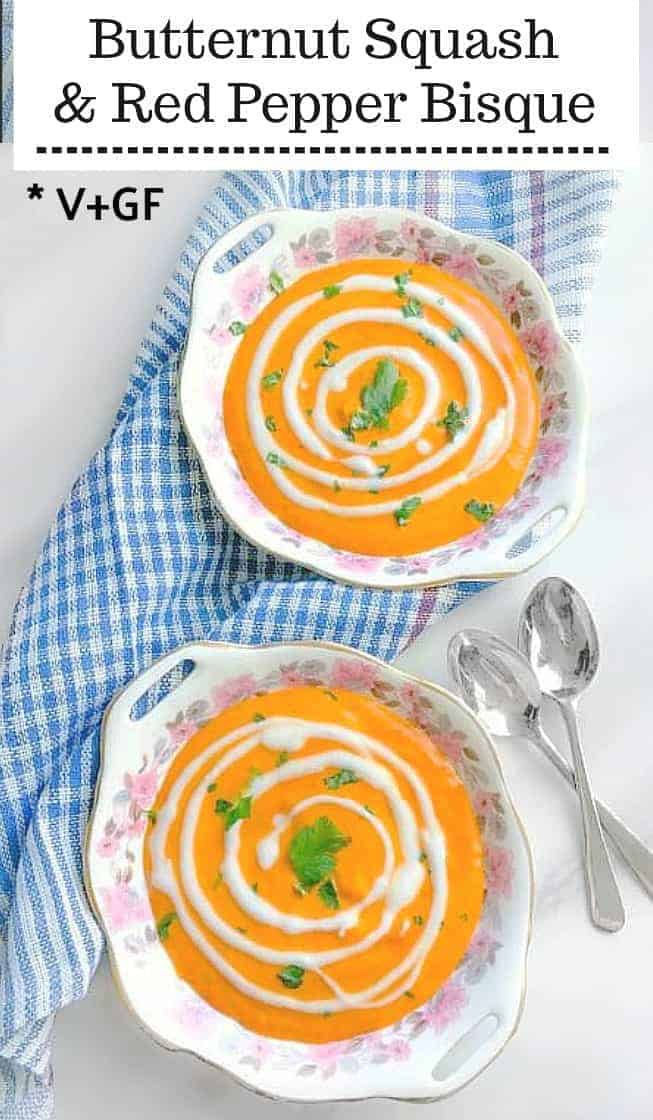 skinny butternut squash red pepper bisque on a marble table with napkins