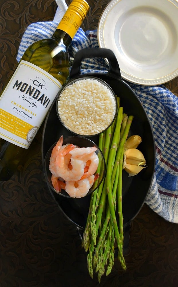 shrimp risotto ingredients in a pan