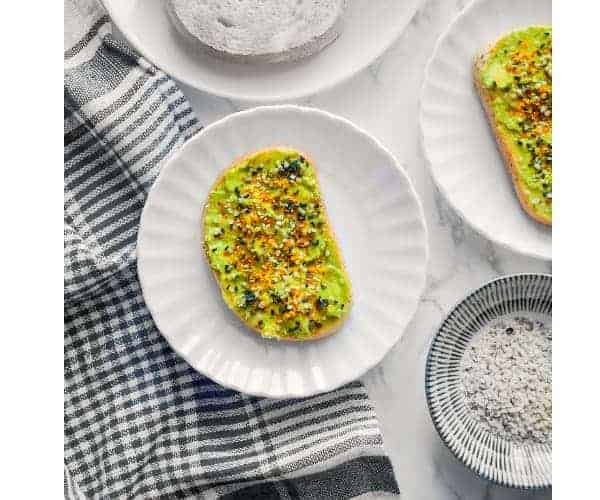 Vegan Avocado Toast Recipe using avocado, sesame seed, turmeric and hemp seeds