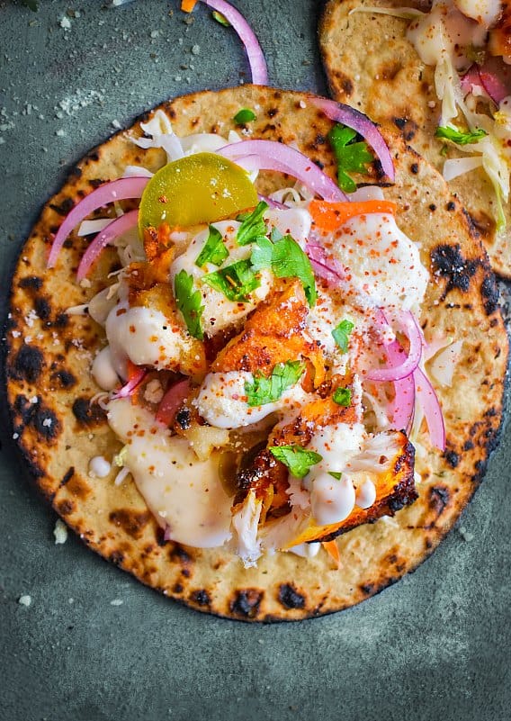 tandoori fish tacos with pickled onions