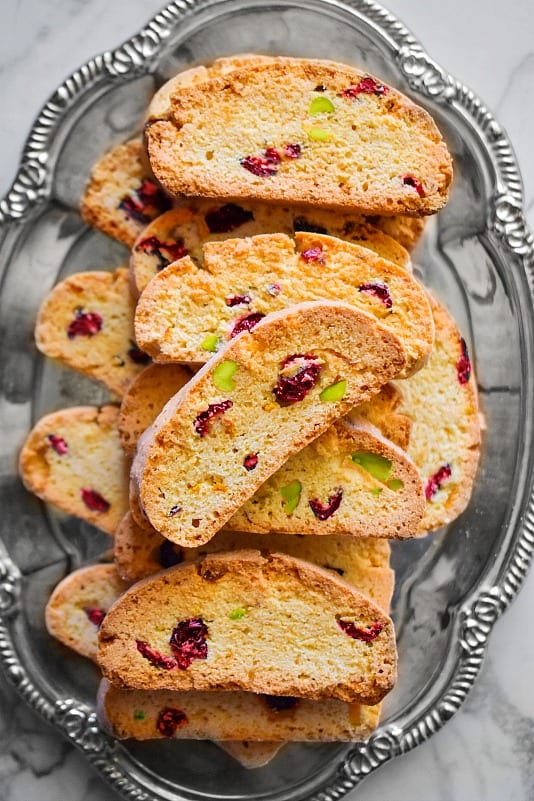 Pistachio Cranberry Orange Biscotti on a silver tray