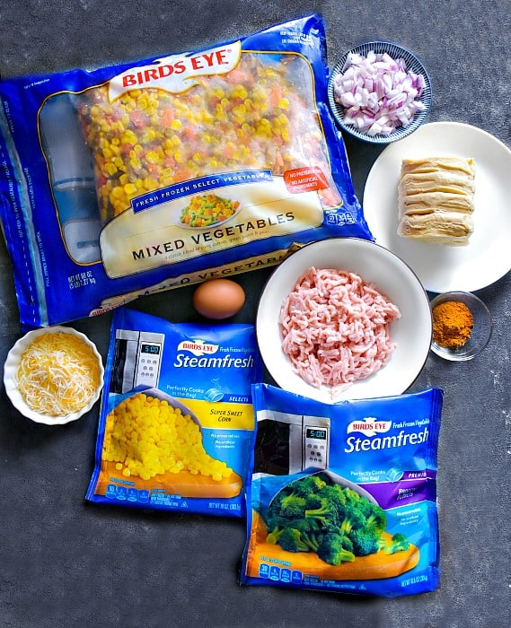 leftover vegetable turkey hand pies ingredients on a blue board