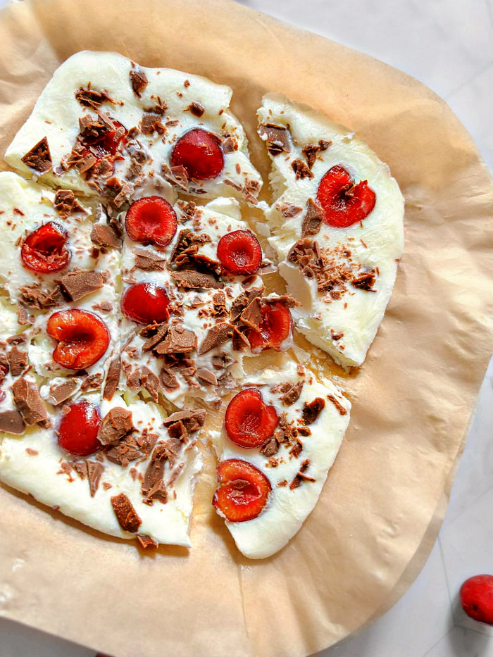 healthy cherry yogurt bark on a white platter